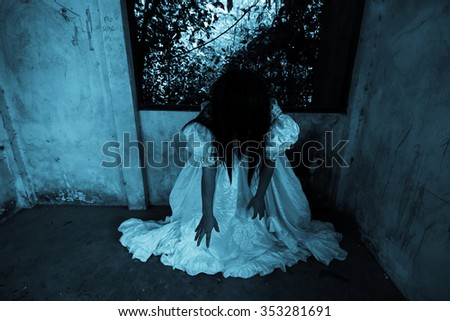 Cry Girl,Ghost in Haunted House,Mysterious Woman in White Dress in Abandon Building,Horror Background For Halloween Concept and Book Cover Ideas