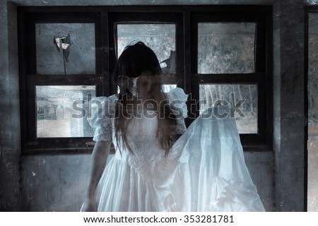 Bride of the Dead,Ghost in Haunted House,Mysterious Woman in White Dress Standing in Abandon Building,Horror Background For Halloween Concept and Book Cover Ideas