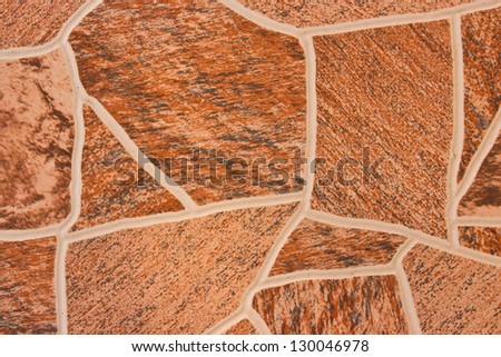 Brown patterned tiles.  With a beautiful patterns.