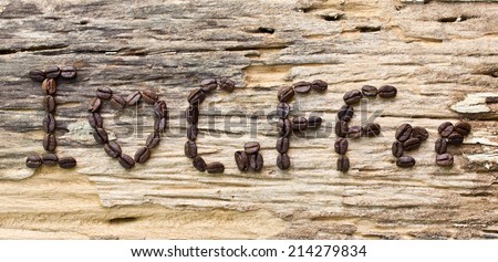 I love coffee made form coffee bean on wood background