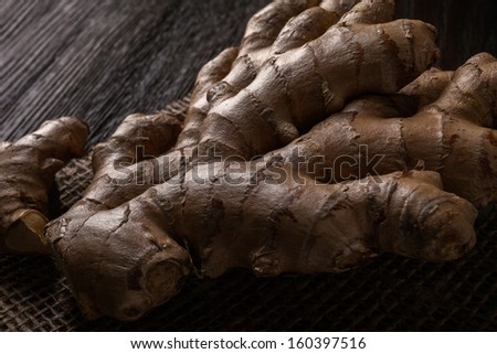 detail of ginger root on dark background