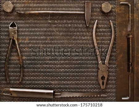 Set of tools to work at home. Grungy metal background