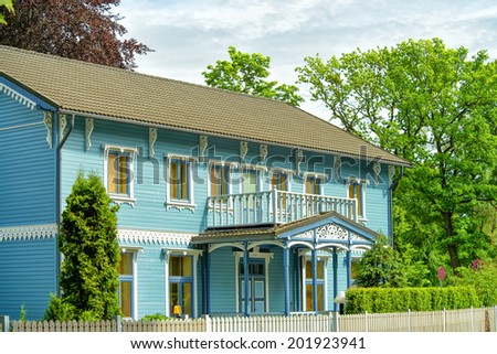 wooden house of blue color