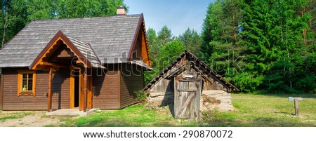 new and old lodges in the forest and link