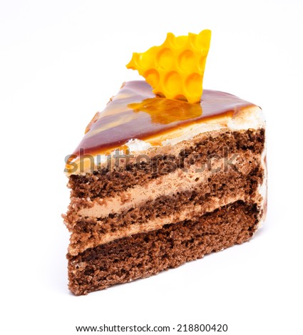 Piece of honey cake isolated on a white background