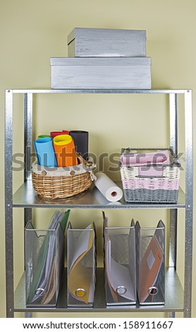 metal shelves with different home related objects