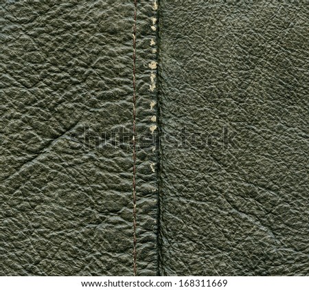 worn green leather texture, stitch. Leather background,
