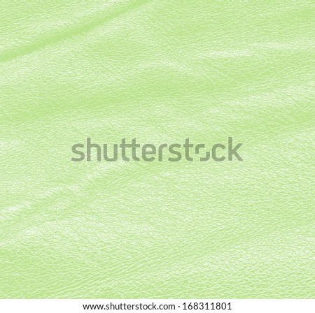 crumpled green leather texture . Leather background
