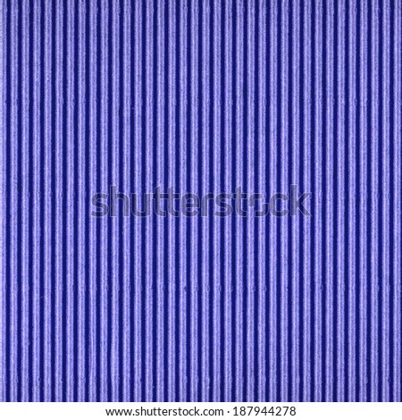 corrugated cardboard painted in blue as background
