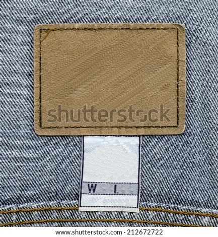 jeans leather label on  blue jeans background