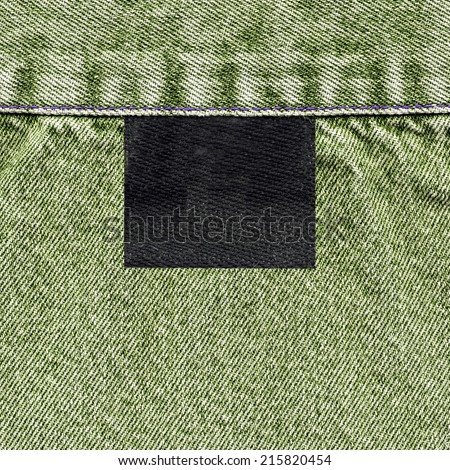 blank black tag and  green jeans texture