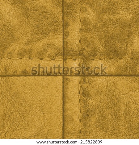 fragment of yellow leather clothing accessories. Useful as background in Your design-work