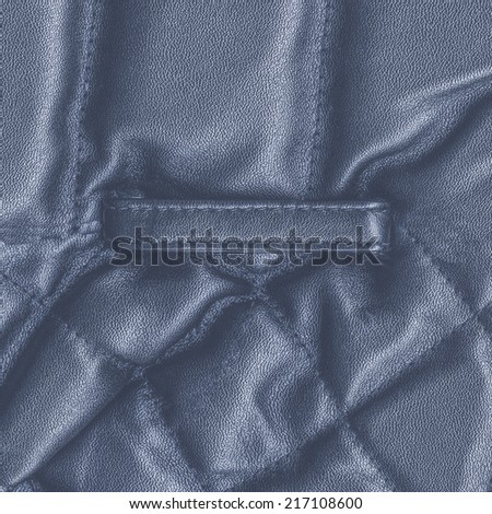 fragment of blue leather clothing accessories closeup