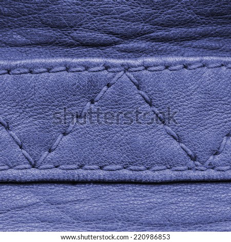 fragment of blue leather coat closeup