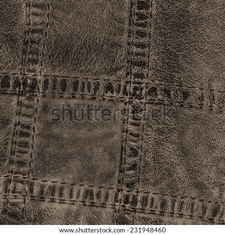 brown leather texture, seams..Fragment of leather clothing accessories