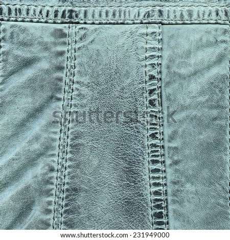 blue leather texture, seams.Fragment of leather clothing accessories