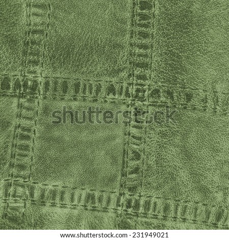 green leather texture, seams..Fragment of leather clothing accessories