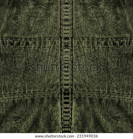 green leather texture, seams.Fragment of leather clothing accessories