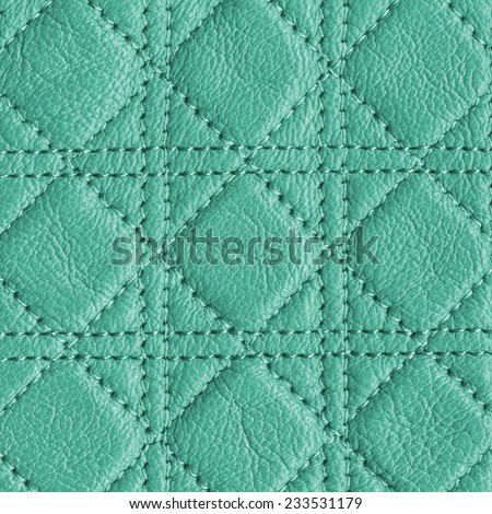 fragment of green-blue leather clothing accessories as leather background.