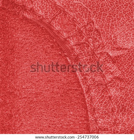 red background of two kinds of leather textures