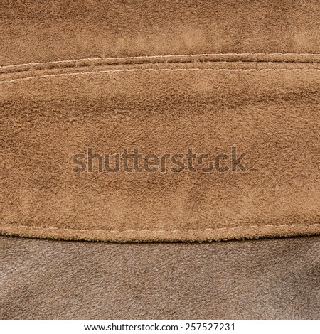 background of two kinds of brown leather, seams