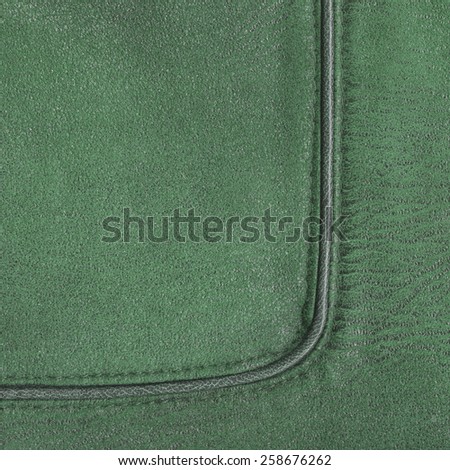 green leather texture,seam. (Fragment of leather jacket