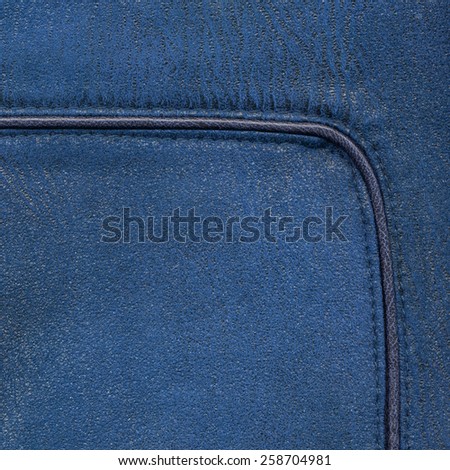 blue leather texture,seam. (Fragment of leather jacket)