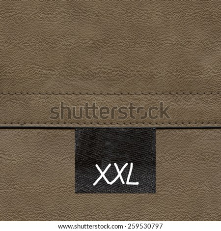 brown leather texture,seams, tag,size