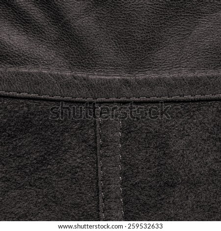 background of two kinds of dark brown leather, seams, stitches