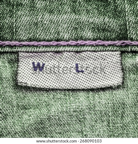 green jeans texture, blank textile label