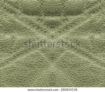 fragment of green leather products.Useful as textured background
