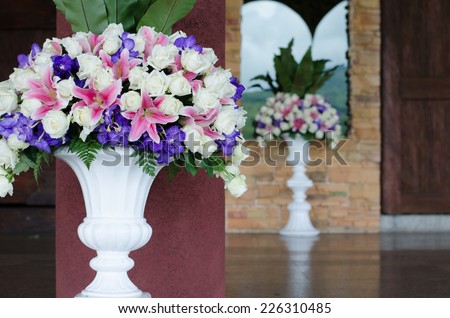 Bunch of flowers in a big decorative vase