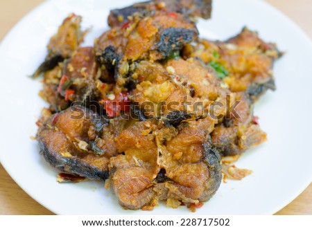 Spicy Stir Fried catfish on dish