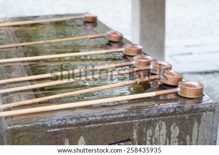 Water dippers at Kotokuin temple, Kamakura, Japan. Used for washing hands and mouth before into temple.