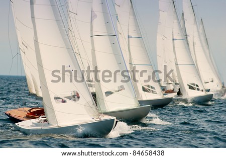 group of dragon yachts at regatta