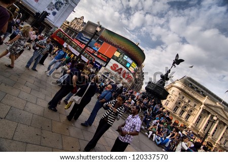 LONDON-MAY 30:People and traffic in Picadilly Circus May 30, 2012 in London.A famous public space in London\'s West End,it was built in 1819 to join Regent Street with the shopping street of Picadilly