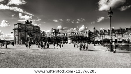 PARIS - JULY 3:Triumphal Arch (Arc de Triomphe du Carrousel) at Tuileries gardens in Paris, France on July 3,2012. Monument was built between 1806-1808 to commemorate Napoleon\'s military victories