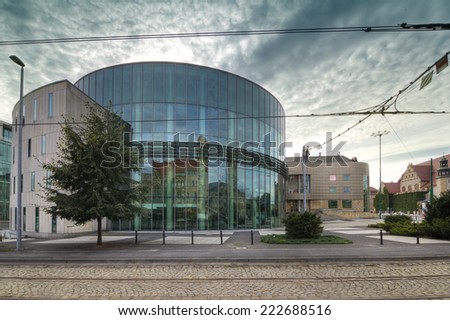 POZNAN, POLAND - JUNE 15, 2014: Glass building auditorium of the Academy of Music in Poznan. Building located in the city center at the intersection of St.. Marcin and Towarowa street.
