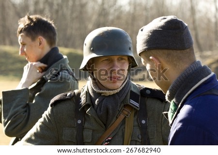 POZNAN, POLAND - MARCH 23, 2014: Re-enactment of the battle of the World War II. Anniversary of the liberation of the city of Poznan.