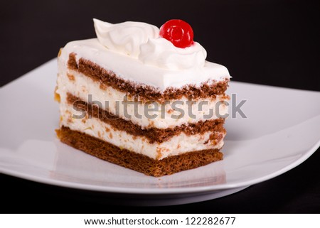 Close up photograph of a delicious vanilla cream cake