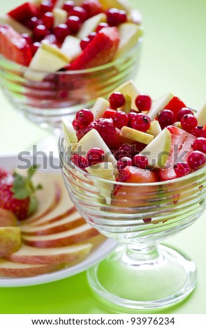 Photograph of two bowls of a colorful fruit salad