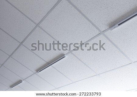 Background of false ceiling with a gallery light attachments.