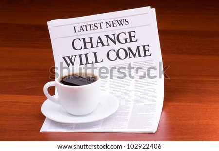 The newspaper LATEST NEWS with the headline CHANGE WILL COME on table