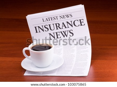 The newspaper LATEST NEWS with the headline INSURANCE NEWS on table