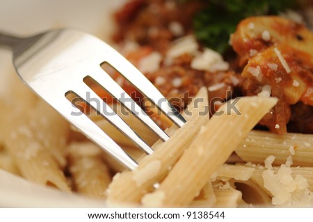 close-up of whole-wheat pasta with bolognese sauce