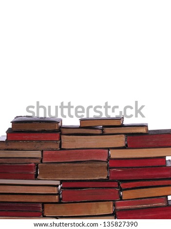 wall of old books with aged pages