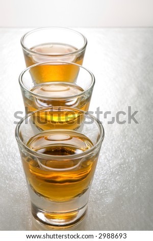 stock-photo-three-shots-of-scotch-whiskey-lined-up-in-a-row-2988693.jpg