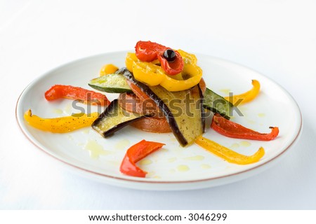 Roasted Vegetable Salad with in assortment of Vegetables, Zucchini, Red bell peppers, yellow bell peppers, tomatoes, drizzled with olive oil