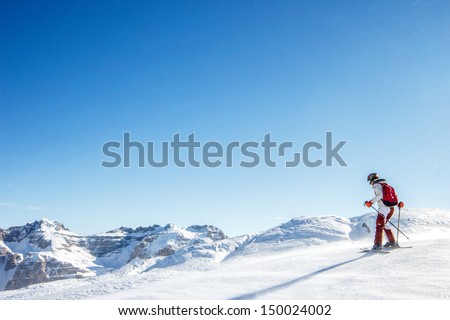 Teenager Learning How To Ski In The Blue Sky Ant Mountains Background