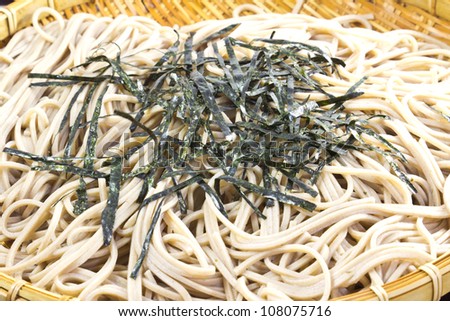 This is a picture of cold noodles with dipping sauce is eaten in Japan.